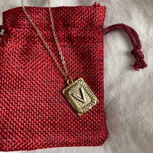 Gold V initial pendant necklace